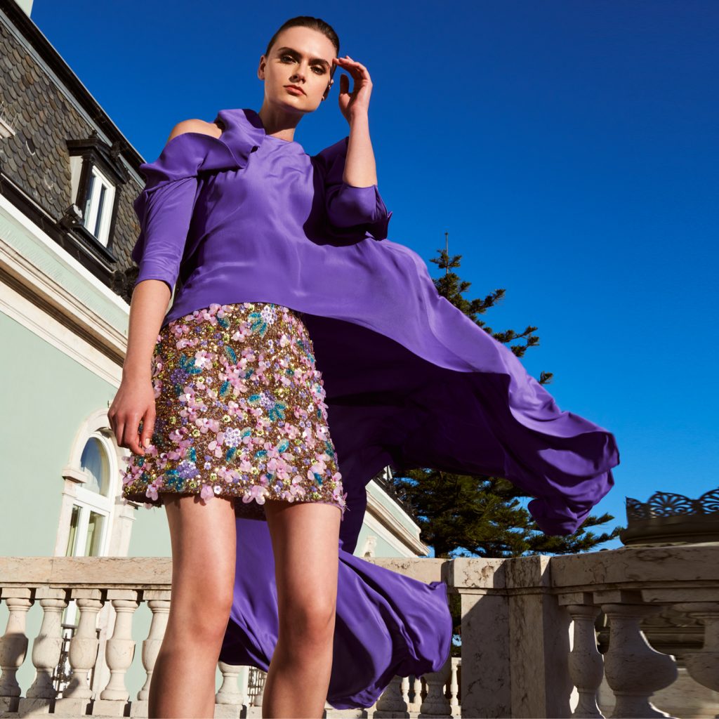 Ripple ruffled sleeve cape top and a retro A-shaped fully embroidered miniskirt