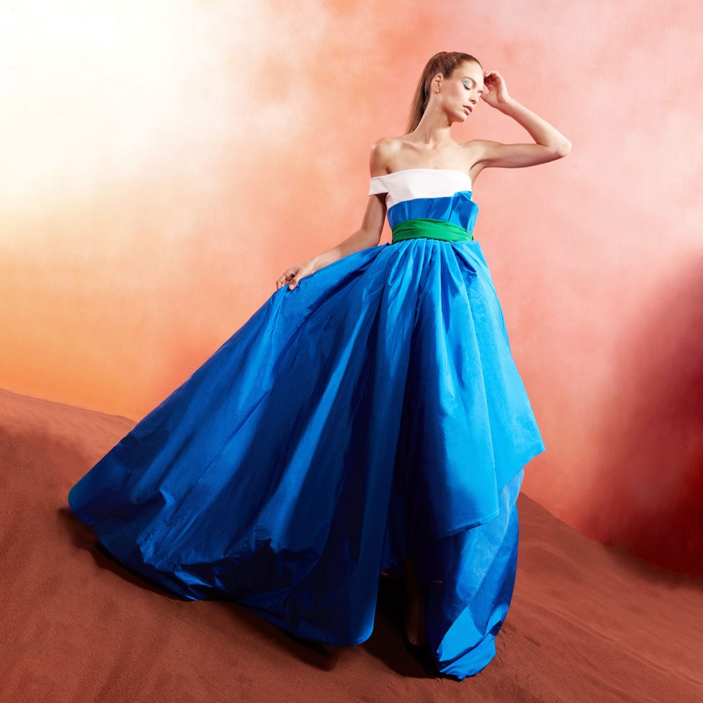Tricolored long high low , strapless bust with one off shoulder , draped waist bi-colored detail over skirt high wait asymmetrical structure.