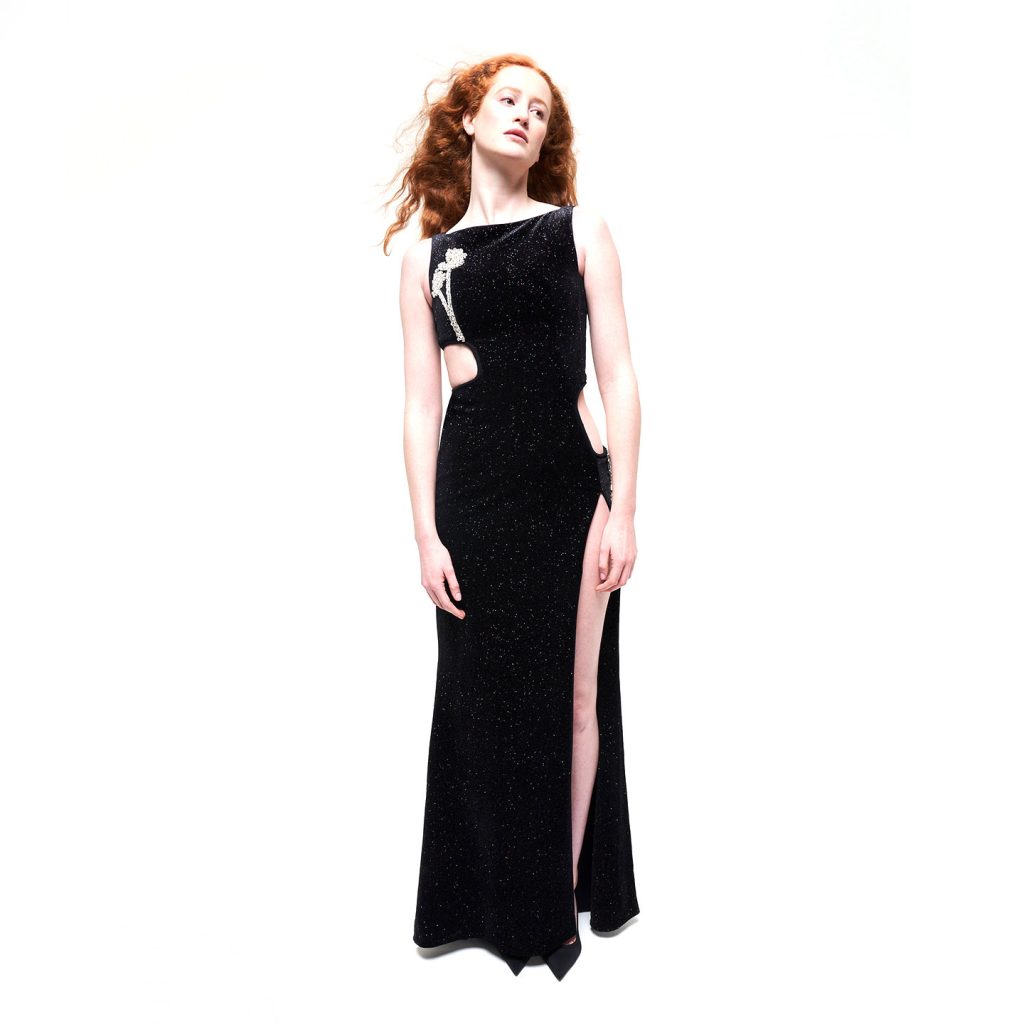 Long sleeved round neck long dress with cutouts on the waist in confetti velvet pippin and deep open back.