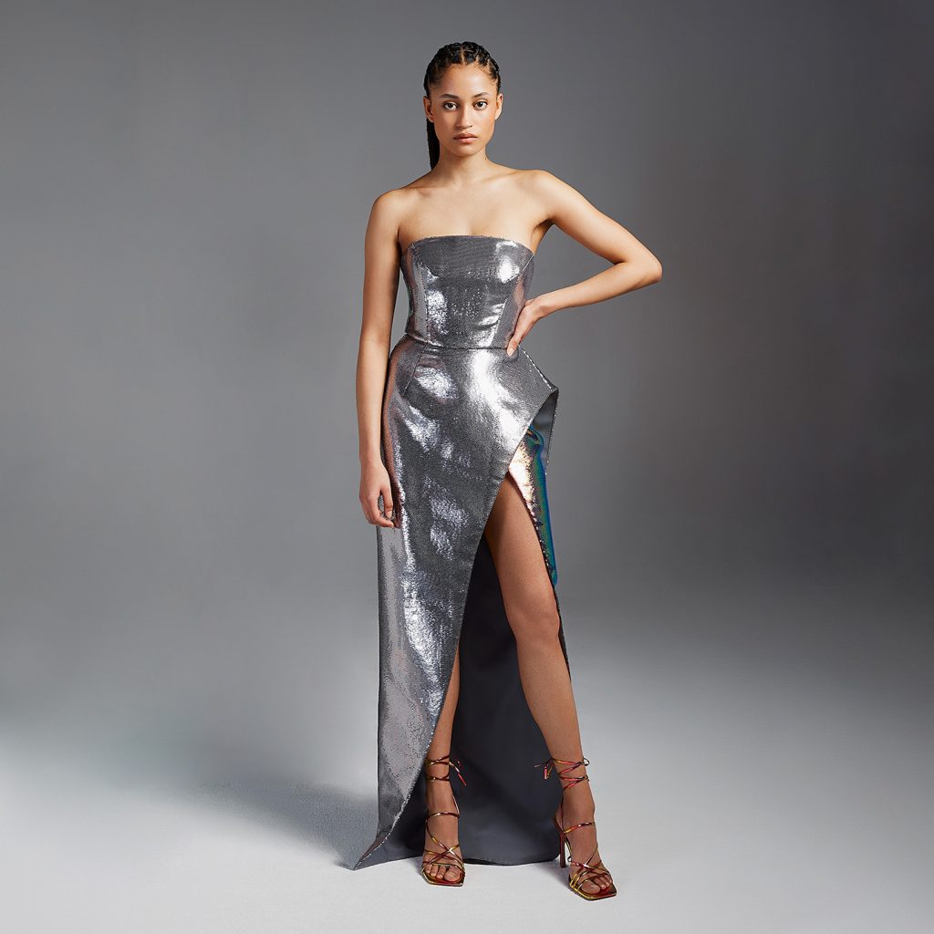 Strapless long dress with structure bust and structured long side slit, with multicolored sequin insert on bust and high side slit.