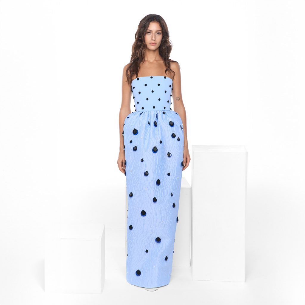 Strapless button embroidered bust and tulip shape skirt with tiered circle embroidery.